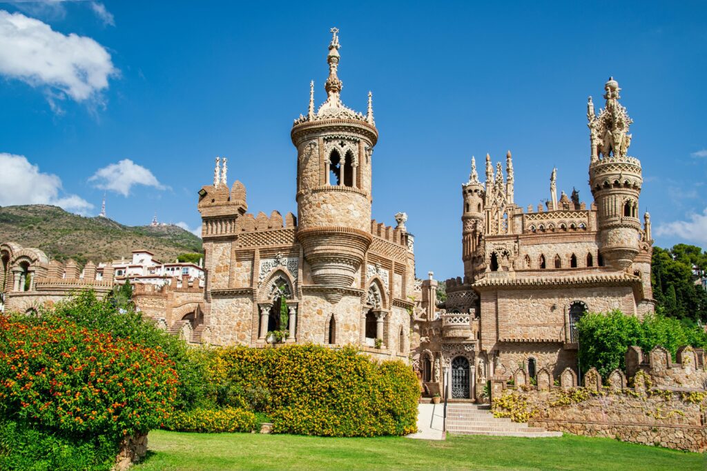 Intricate stone turrets and fairytale architectural details of Castillo de Colomares in Benalmádena Pueblo.